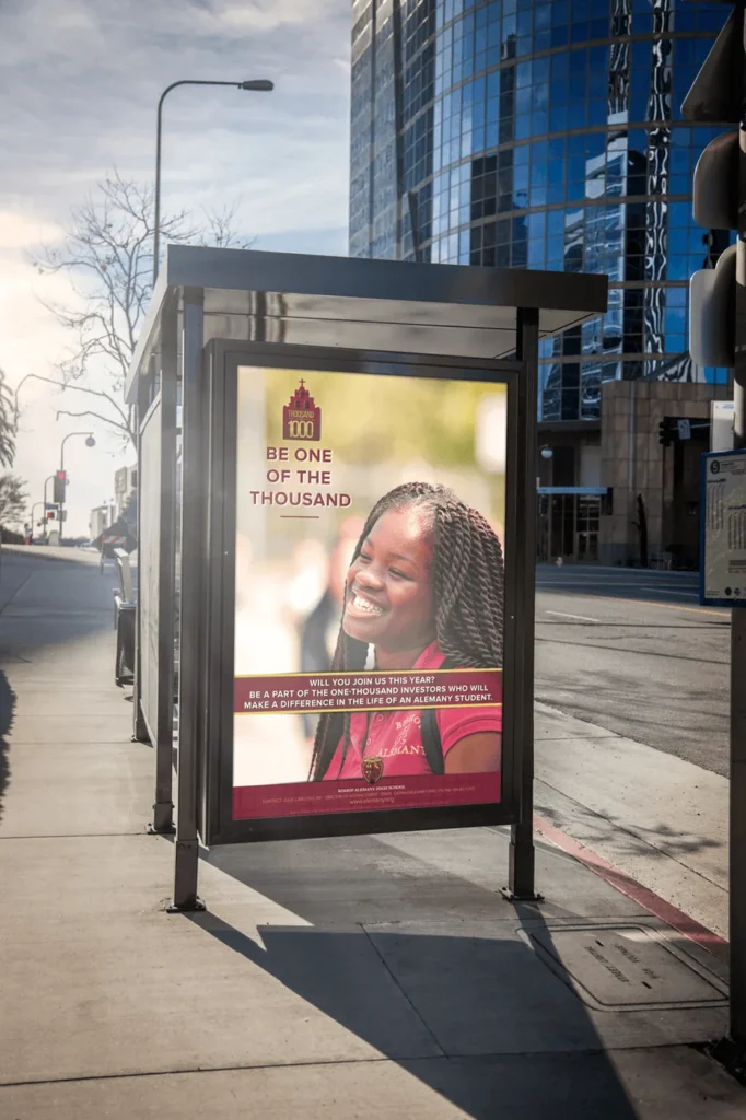 A school poster in a bus shelter on a city street
