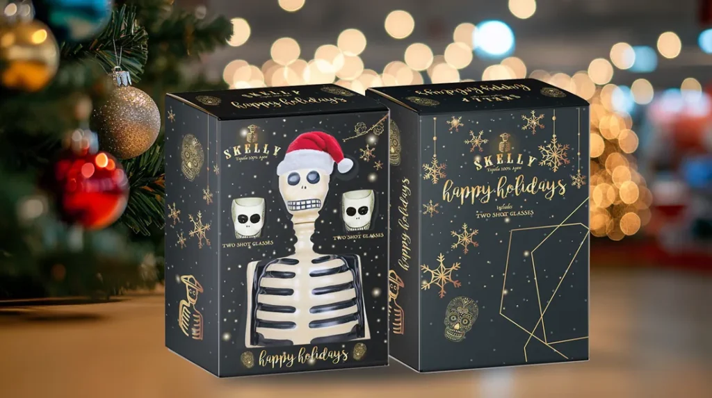 Two holiday gift boxes on a shop counter