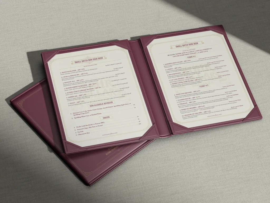 A printed menu in an open cover