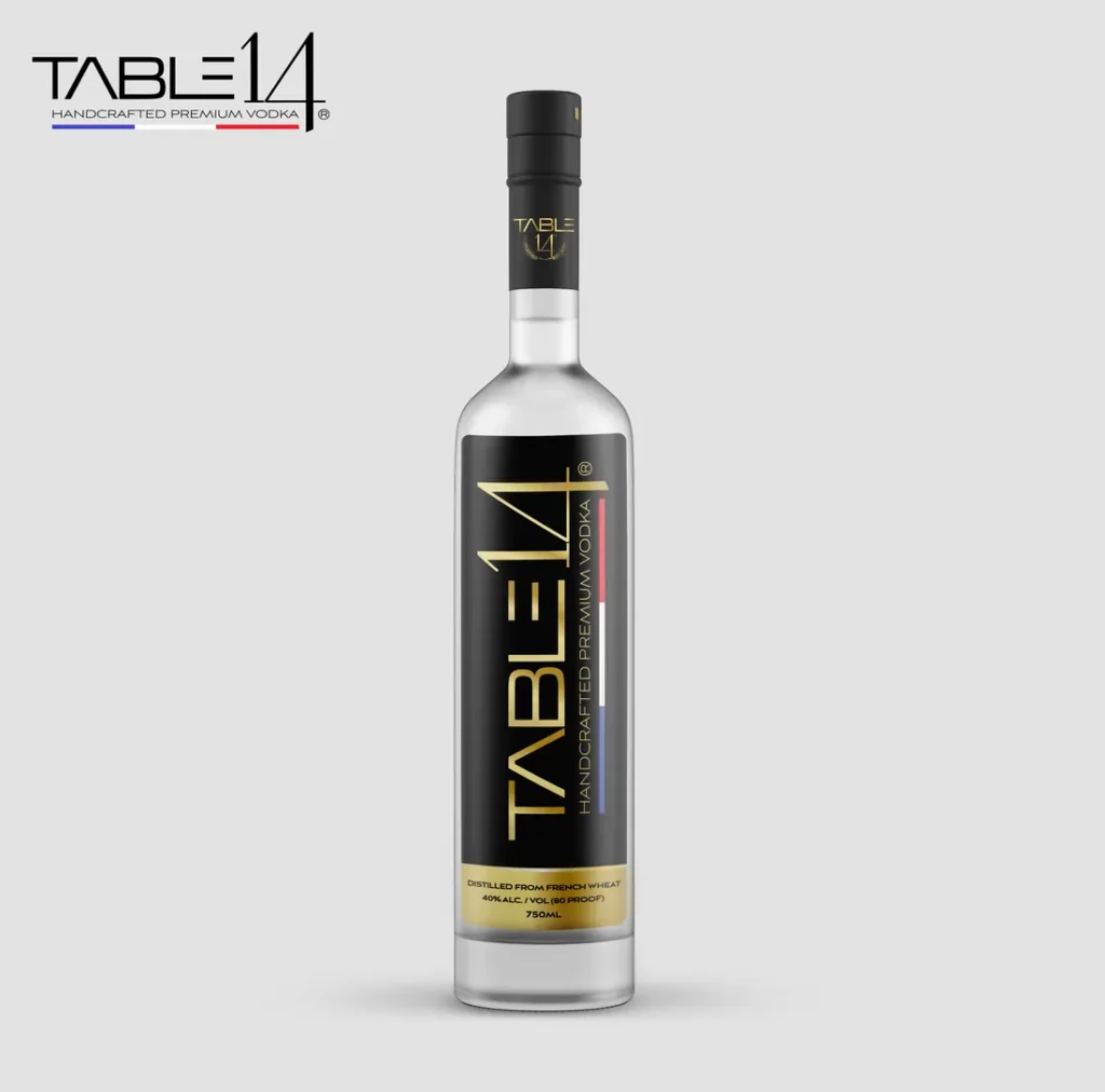A vodka bottle with a black and gold label